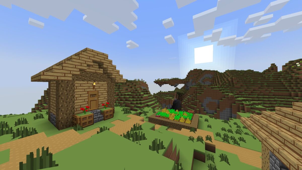 Maison de village et paysage de plaine avec le Plastic Texture Pack dans Minecraft