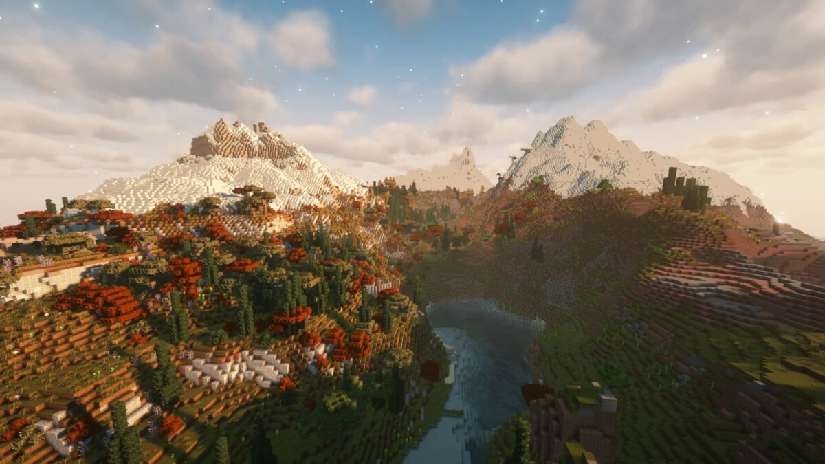 Paysage dans Tales of Aged Minecraft montrant des montagnes et une vallée avec des arbres aux couleurs automnales, illustrant les différentes saisons.