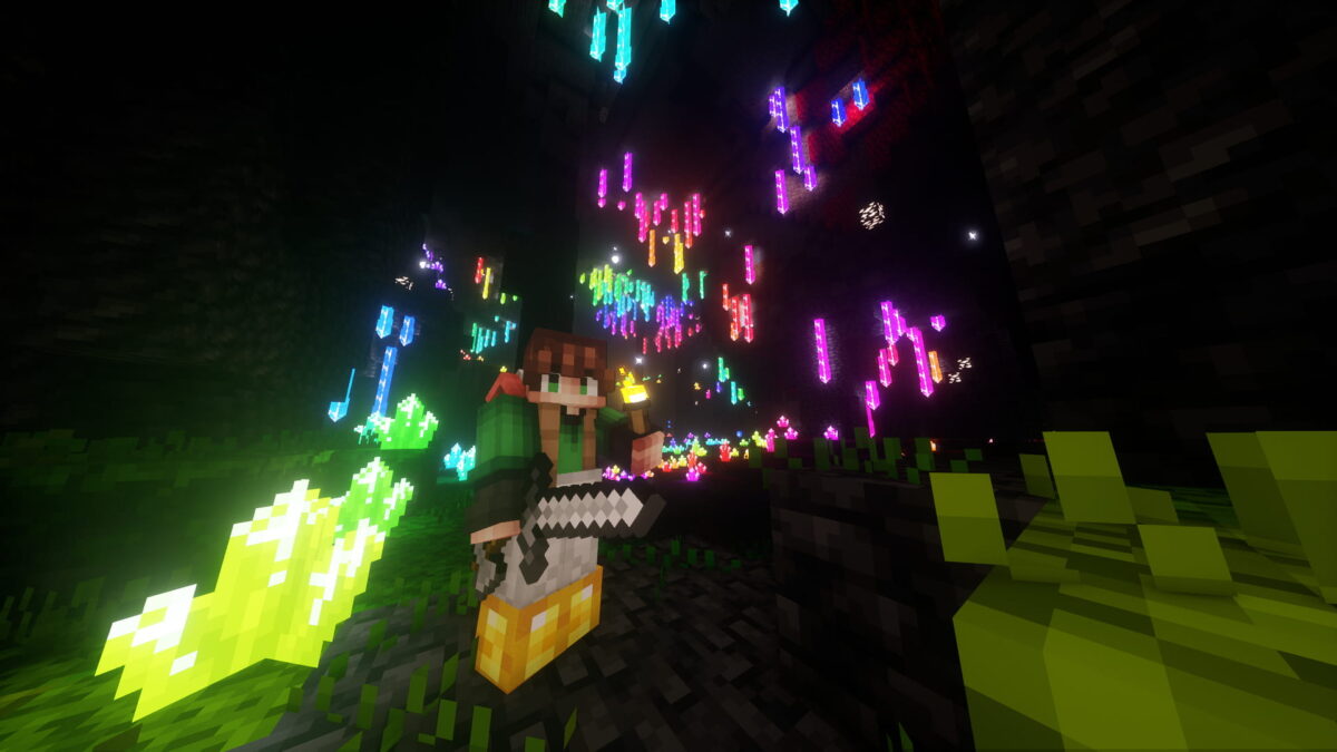 exploration d'une grotte avec des cristaux colorés dans le modpack Elysium Days pour Minecraft