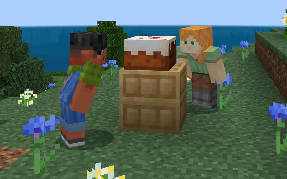 Deux personnages dans Minecraft mangeant un gâteau sur une table