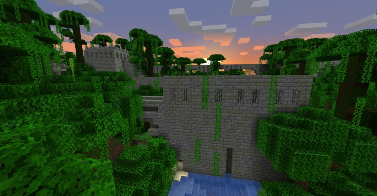 Jungle Fortress Repurposed Structures mod Minecraft - forteresse en pierre dans un biome de jungle, avec des briques infestées de Silverfish.