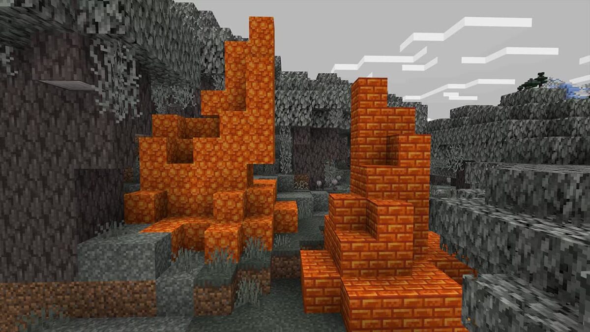 Blocs de résine Minecraft dans le Jardin Pâle, matériau de construction orange en briques.