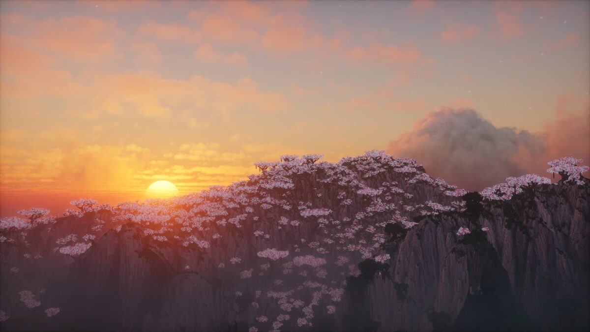 Coucher de soleil sur une montagne fleurie dans Minecraft avec le shader Photon, ciel coloré et nuages volumétrique