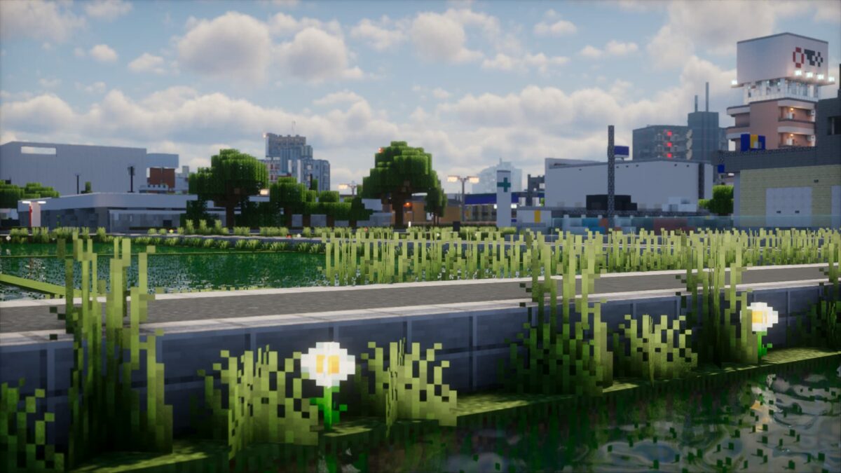 Zone urbaine avec espace vert dans Minecraft, shader Photon, ciel clair et végétation