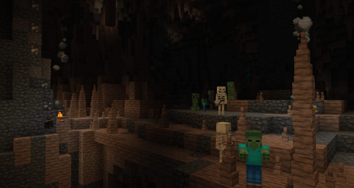 caverne sombre avec des stalagmites et des créatures hostiles, pack de textures Pixel Perfection Legacy pour Minecraft