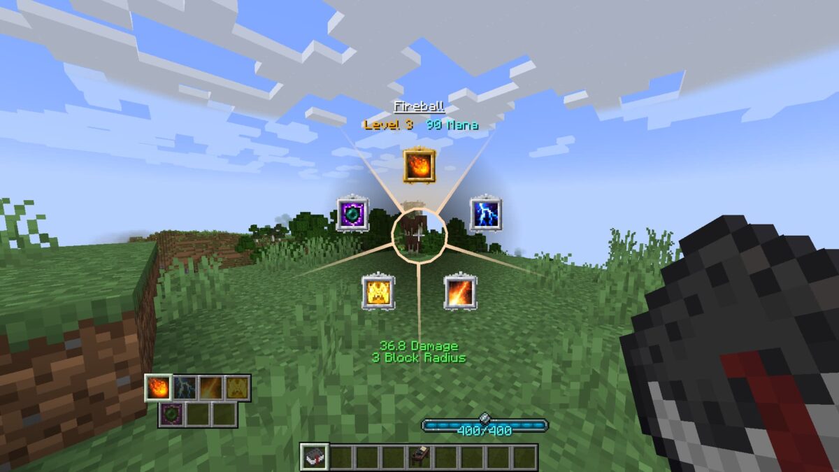 utilisation de la roue de sorts dans irons’s spells 'n spellbooks minecraft pour sélectionner des capacités magiques