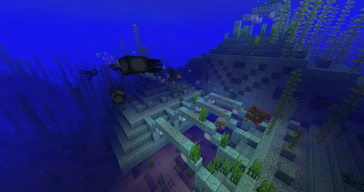 Un gardien de Minecraft tirant un rayon laser sur un poulpe près d’un monument sous-marin.