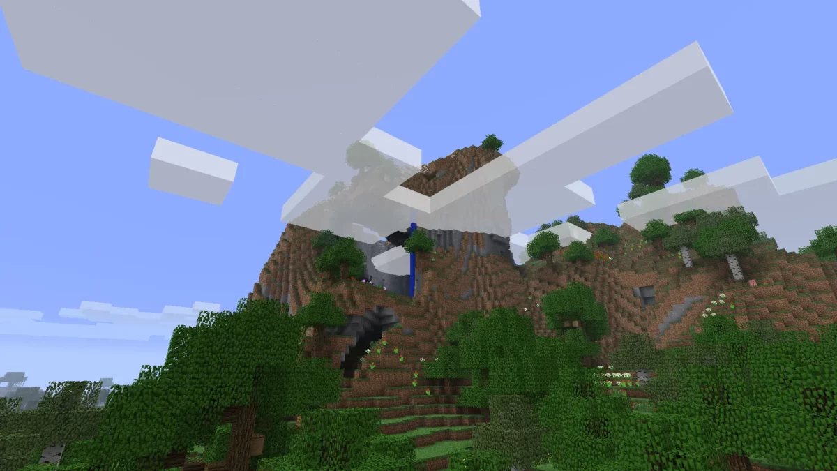 montagne rétro avec nuages et cascade dans Minecraft avec le pack de textures Golden Days