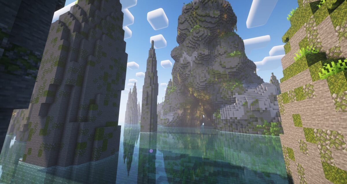 modpack Minecraft MC Eternal 2 dans un biome montagneux luxuriant avec formations rocheuses verticales et végétation