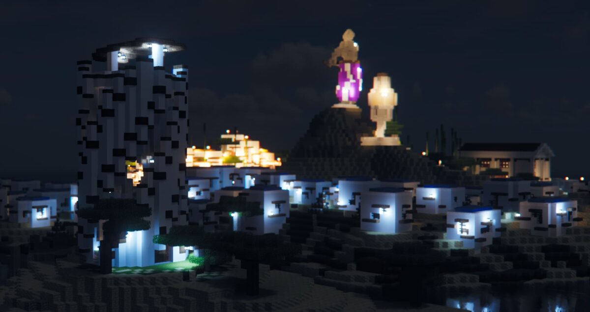 Vue nocturne d’un quartier moderne de la Greek City map Minecraft, avec tours blanches, éclairages bleutés et statue visible au loin.