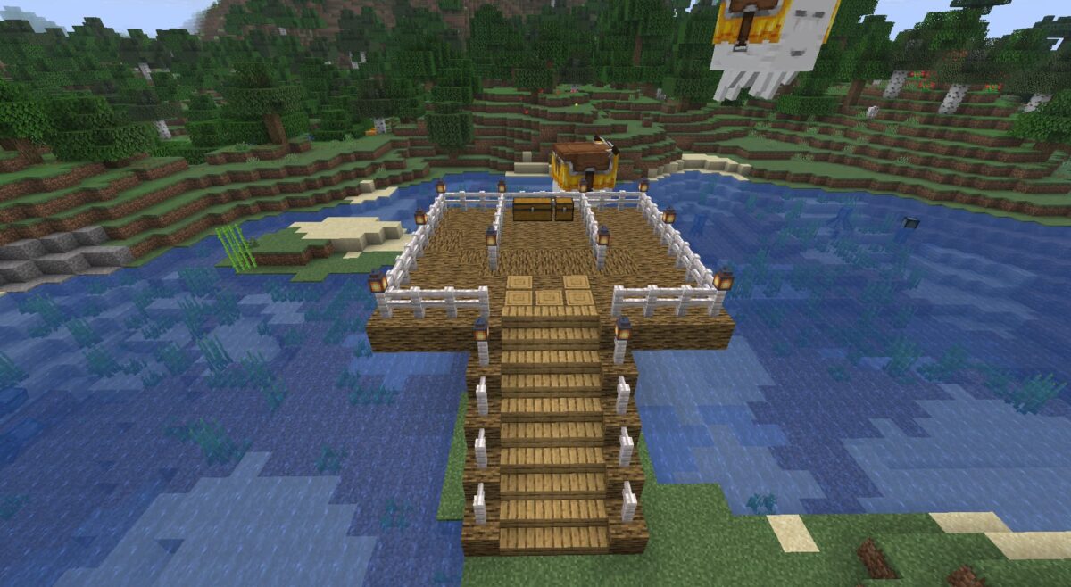Plateforme sécurisée dans Minecraft avec barrières blanches, lanternes et coffres pour station de ghasts joyeux.