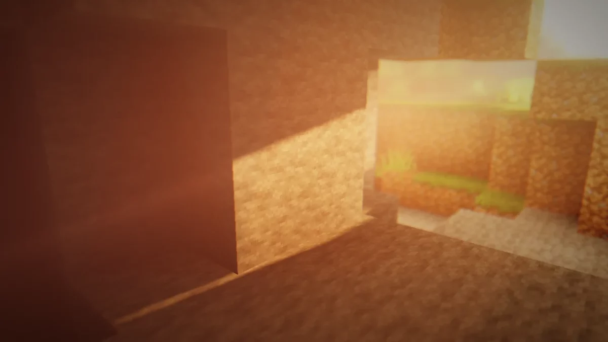 Rayons lumineux entrant dans une grotte Minecraft au lever du jour, effet volumétrique du shader RedHat.