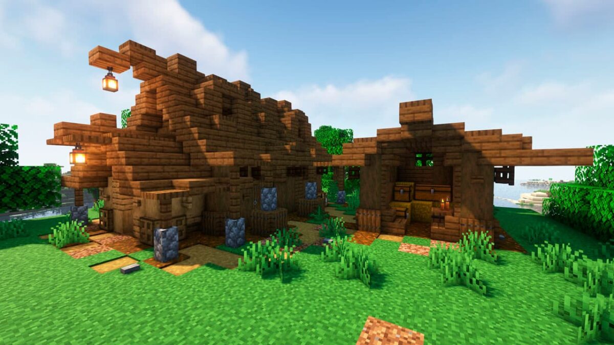 Deux maisons en bois générées par le mod Medieval Buildings dans Minecraft, avec une architecture médiévale typique et des blocs vanilla.