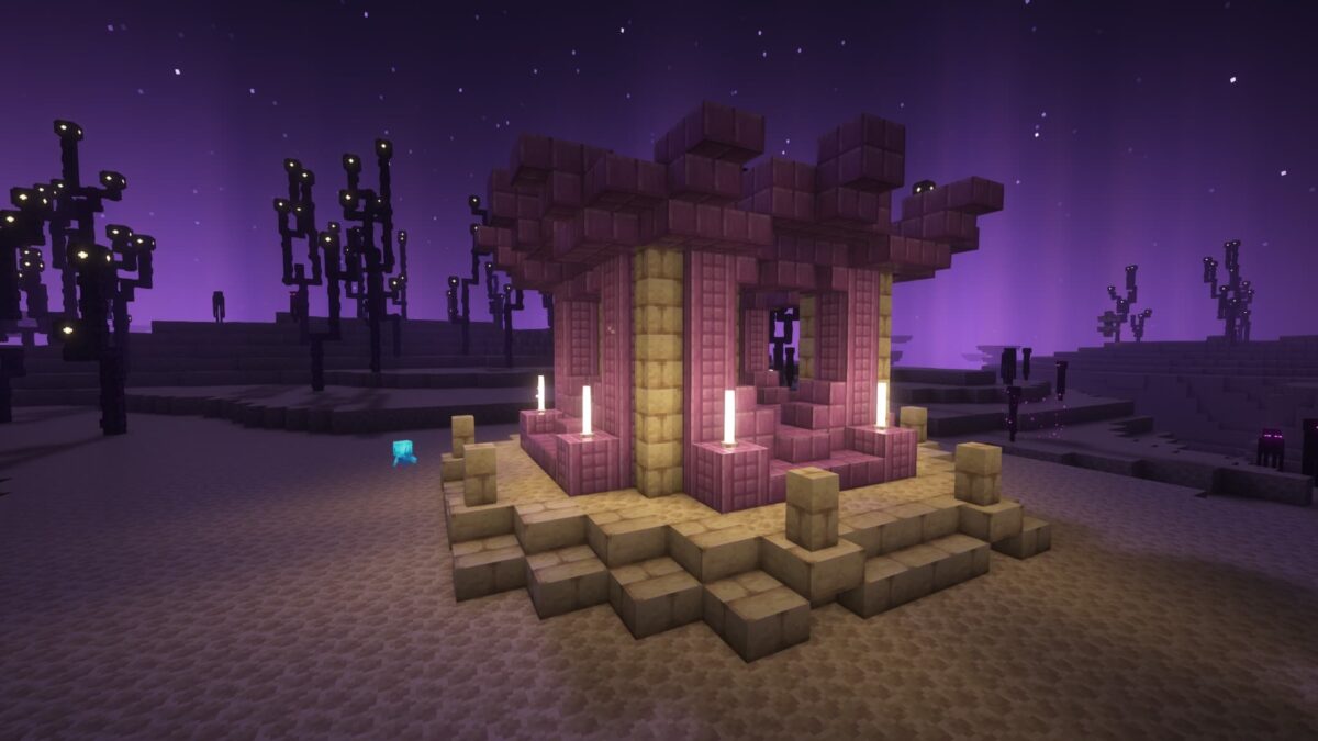 Petit temple octogonal en purpur généré dans l’End par le mod Medieval Buildings, éclairé par des lanternes lumineuses.