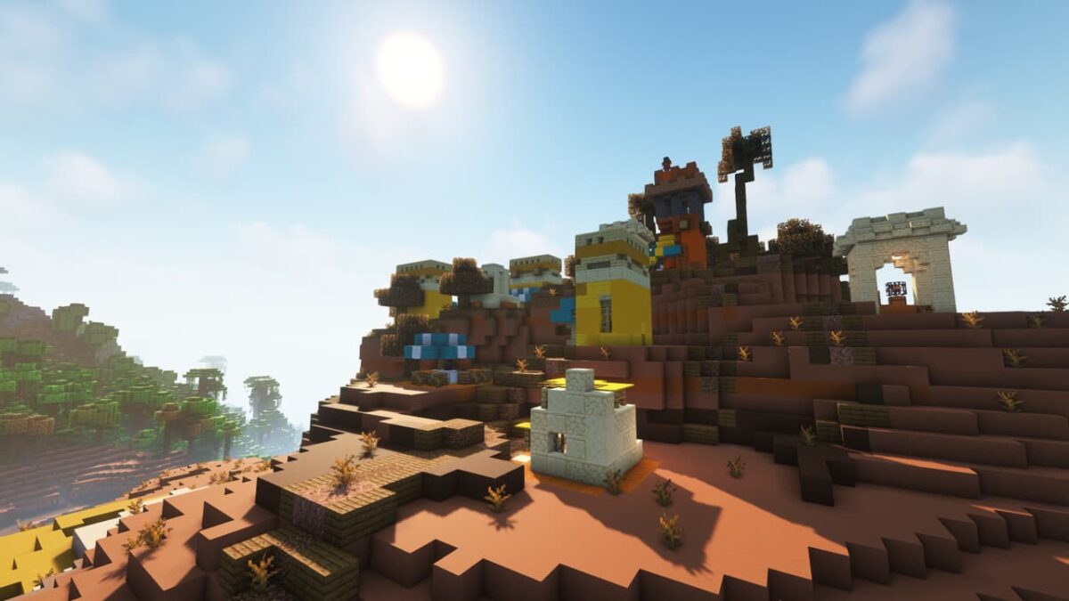 Village en terre cuite colorée sur une colline désertique, avec plusieurs bâtiments compacts, structure du mod When Dungeons Arise.