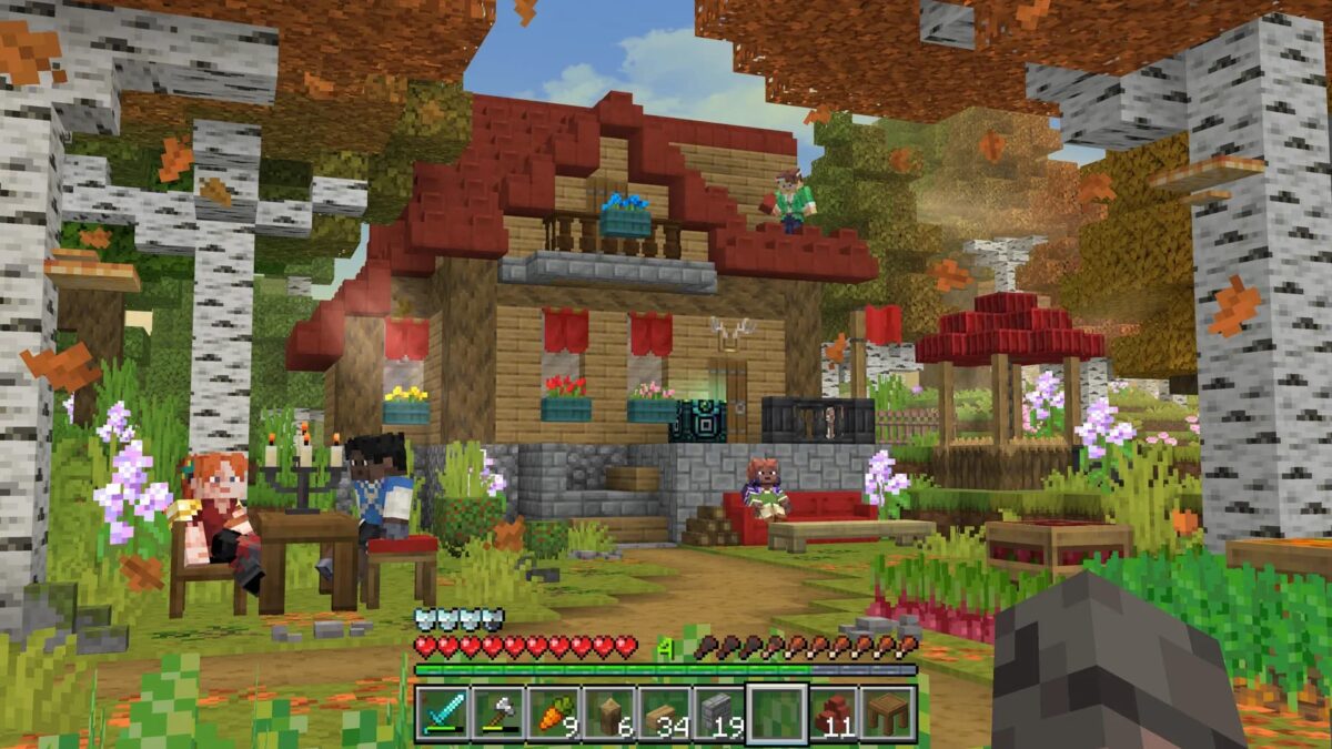 Maison construite avec blocs et meubles de RealismCraft dans un village animé.