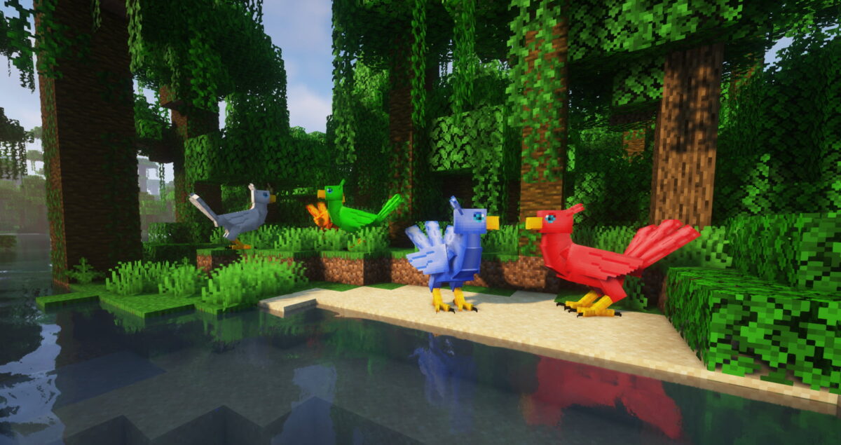 Courier Birds dans le mod Mythic Mounts pour Minecraft, oiseaux colorés des jungles capables de transporter un petit inventaire.