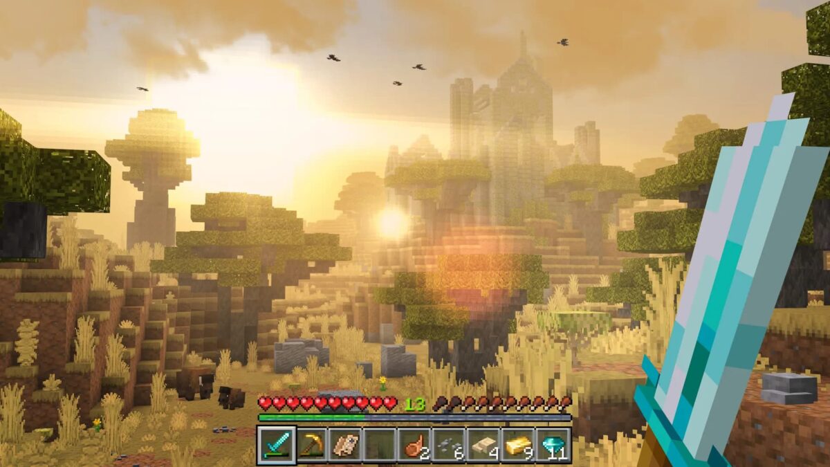 Biome de savane dans RealismCraft avec lumière réaliste et ruines lointaines.