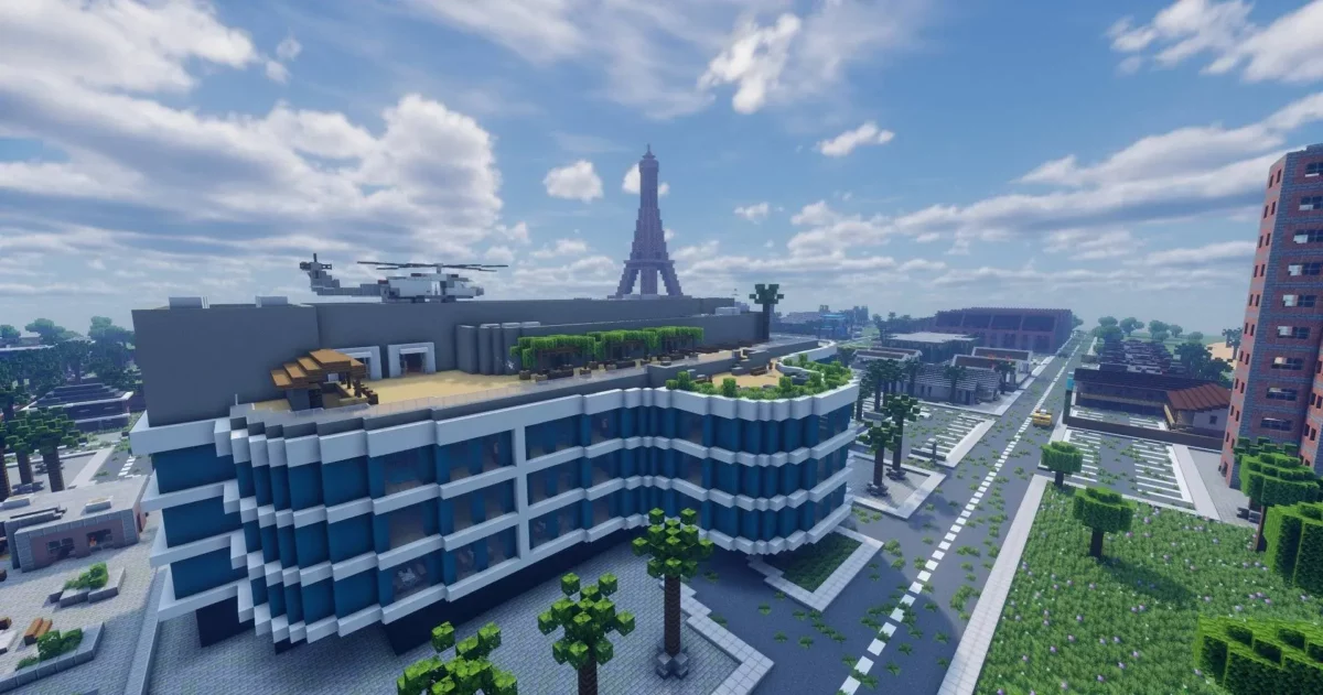 complexe hôtelier Diamond Hotel Resort dans la carte The Zombie Apocalypse X pour Minecraft avec héliport et tour Eiffel au loin