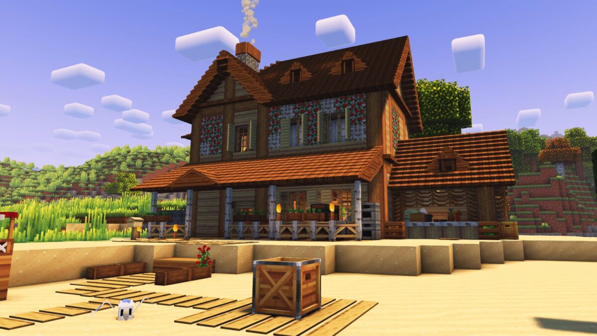 grande maison sur plage dans le modpack Minecraft BigChadGuys Plus avec façade fleurie et toit en tuiles
