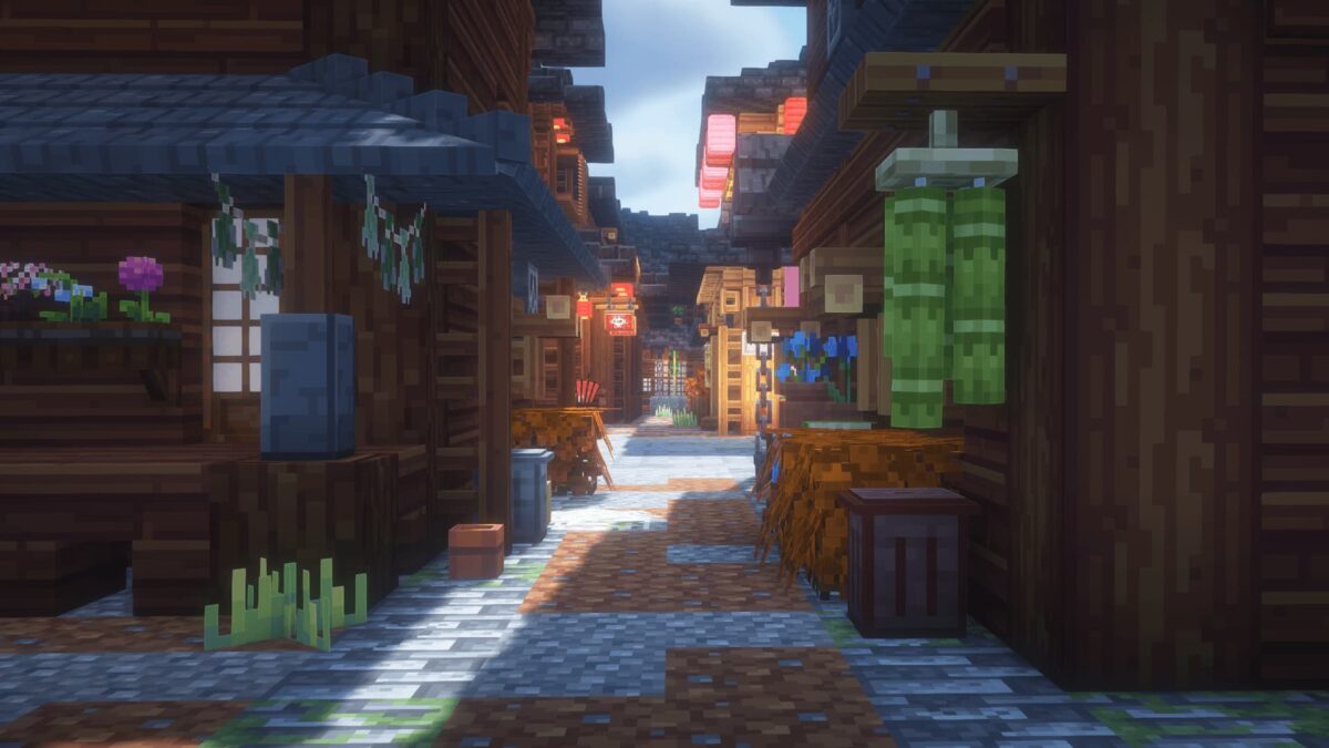 ruelle décorée dans le modpack Minecraft BigChadGuys Plus avec lanternes, plantes et étals de marché