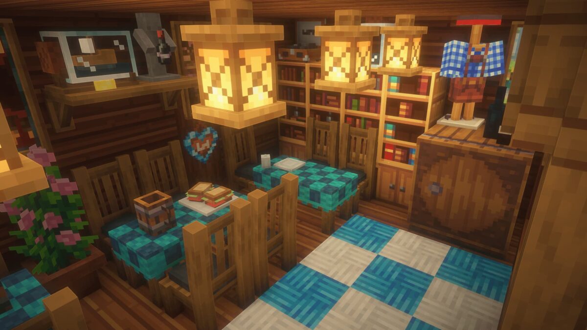 salle à manger décorée dans le modpack Minecraft BigChadGuys Plus avec tables en bois, livres et lanternes