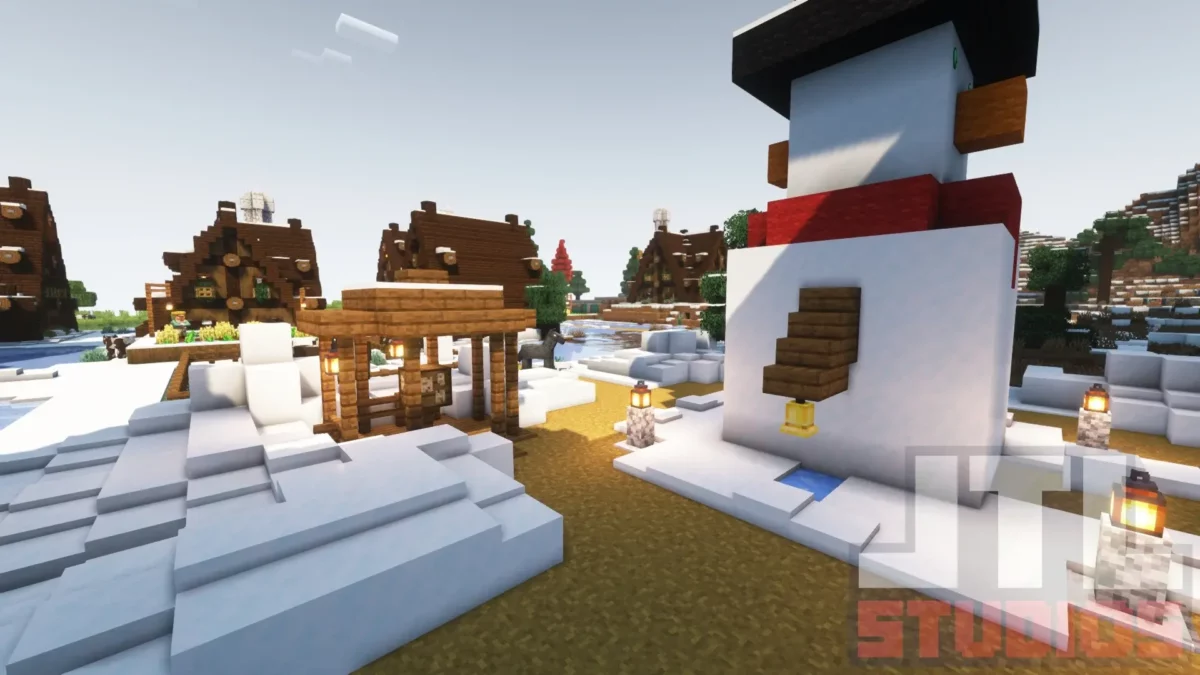 Place centrale d’un village enneigé amélioré par le mod Minecraft Better Villages avec chemin dégagé et éléments décoratifs