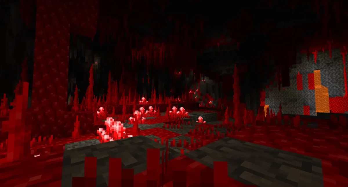 Grottes rouges riches en formations minérales et végétation souterraine dans le mod Minecraft Regions Unexplored, ambiance sombre et minérale.