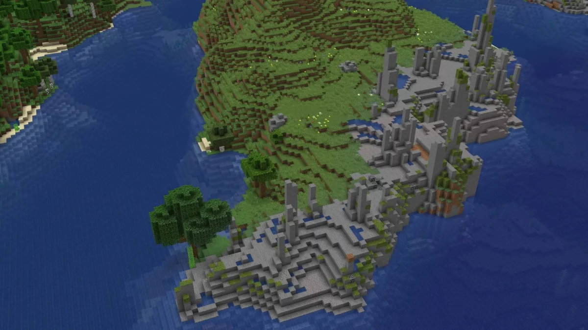 mod Minecraft Geophilic Vanilla Biome Overhauls montrant un littoral rocheux retravaille avec formations de pierre et falaises plus structurees en bord de mer