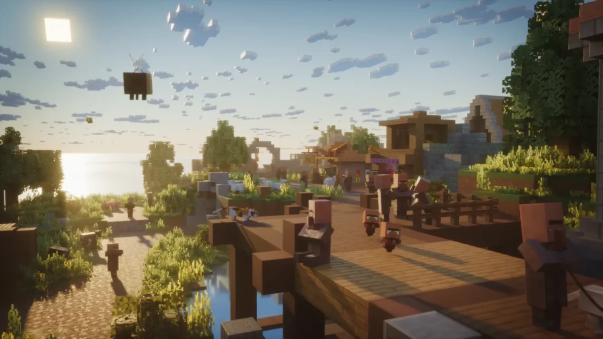 Capture du trailer de Minecraft Dungeons II montrant un village paisible au lever du soleil, avec des villageois sur un pont en bois, des animaux et un Ghast au loin
