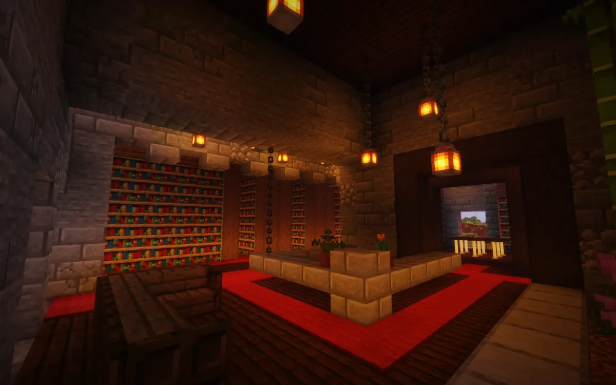 mod Minecraft The Lost Castle bibliothèque intérieure aux étagères pleines et lanternes suspendues