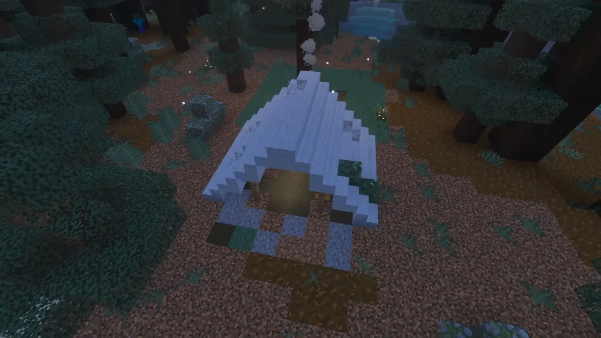 Minecraft camp abandonné vu de dessus montrant un toit de tente en escaliers et dalles de laine
