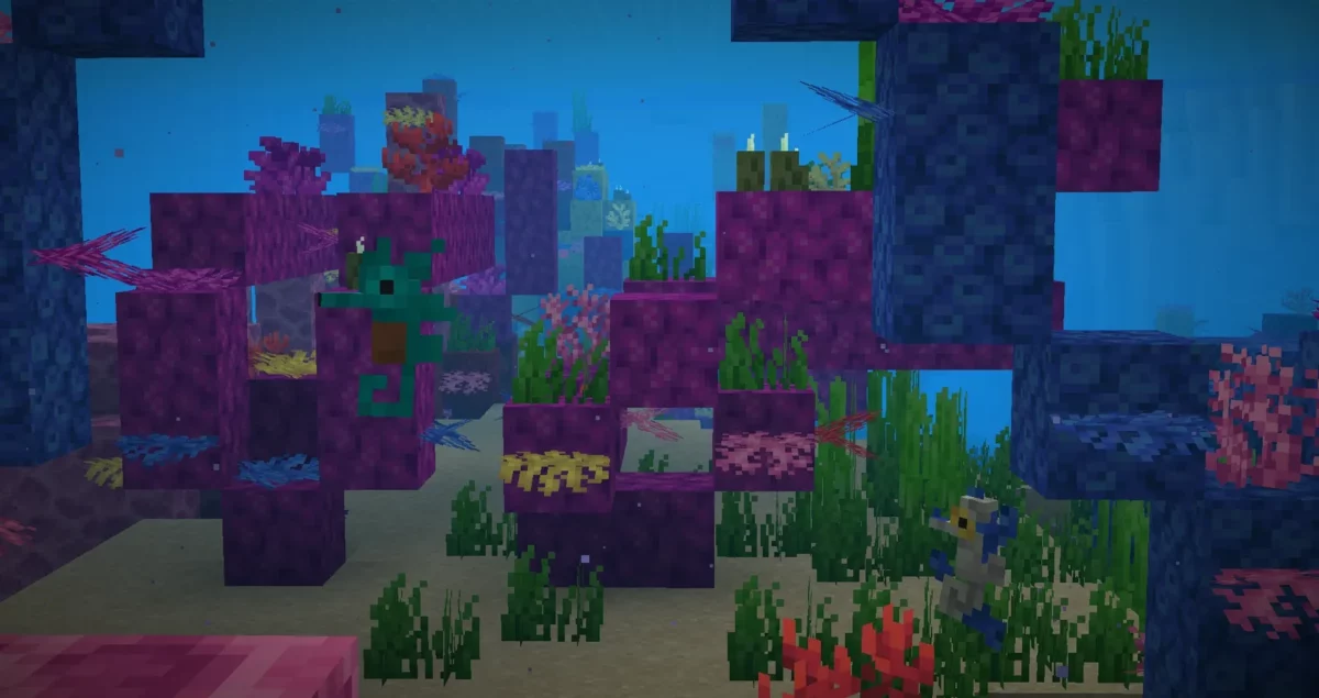 mod Minecraft Spawn hippocampe vert accroché à un récif de corail violet dans un océan chaud