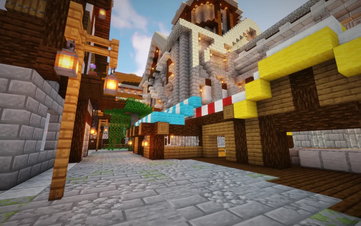 mod Minecraft The Lost Castle allée pavée avec étals de marché et auvents colorés au pied d'une tour