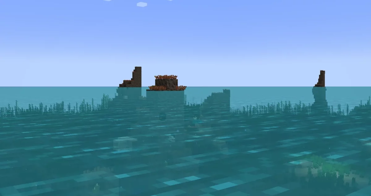 mod Minecraft Spawn vue d'ensemble de l'océan chaud profond avec rochers émergés et seagrass à la surface