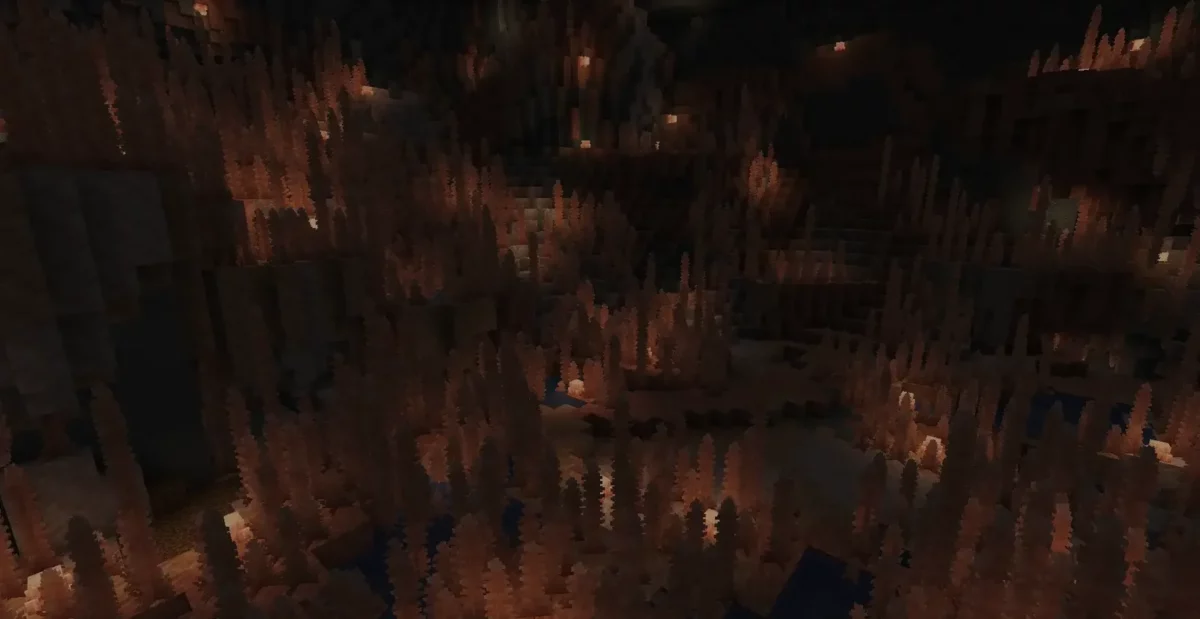 mod Minecraft Galosphere biome Pink Salt Caves avec stalagmites de sel rose saumon dans une caverne sombre