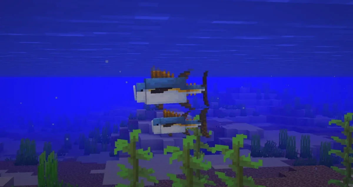 mod Minecraft Spawn thon adulte nageant à côté d'un bébé thon dans un océan tempéré