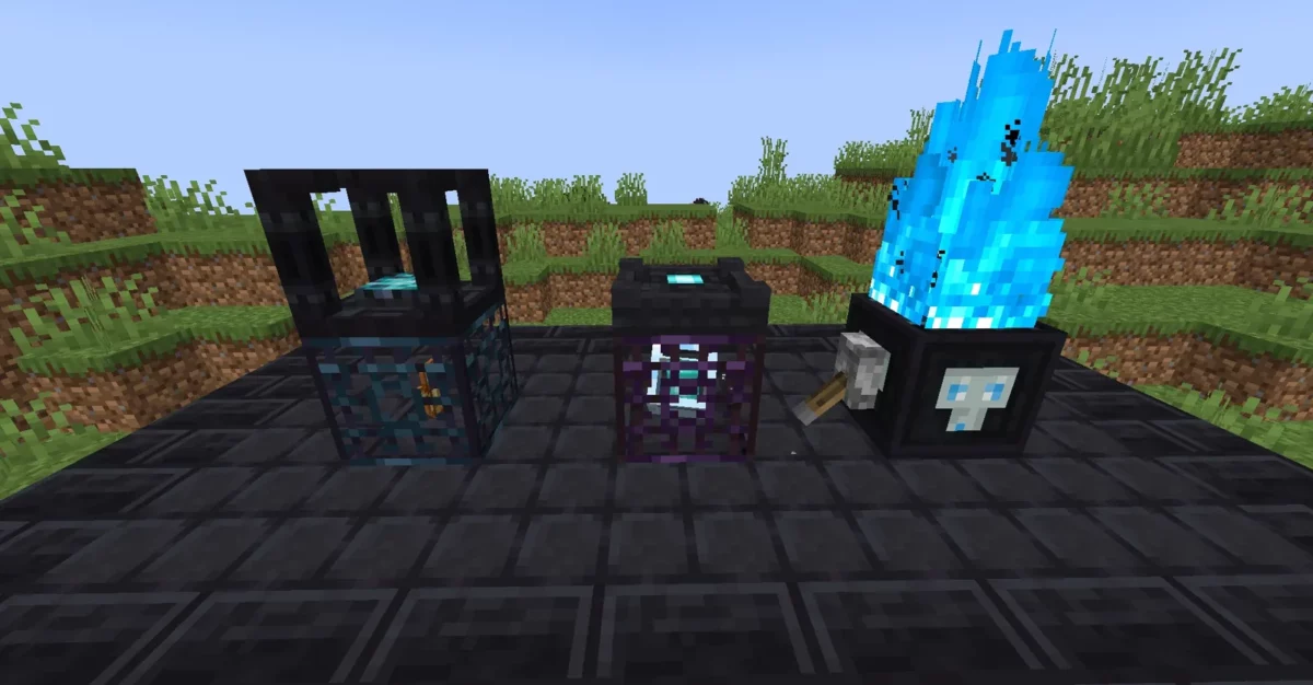 mod Minecraft Goety The Dark Arts trois artifices magiques posés sur un sol de pierre sombre près d'un champ