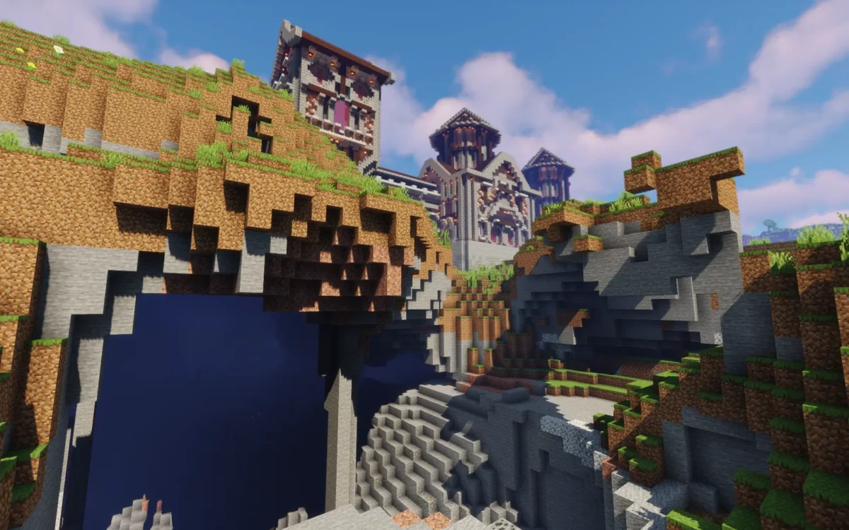 mod Minecraft The Lost Castle château perché sur une falaise dominant une vallée et un petit lac
