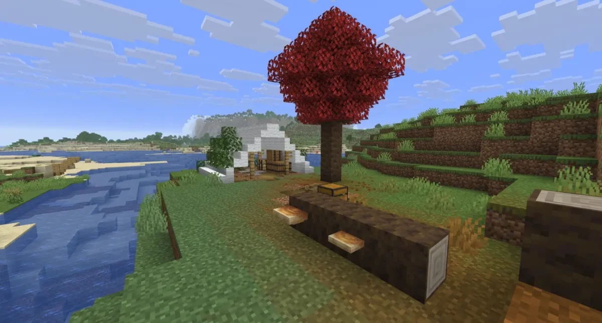 Minecraft 26.3 champignons d'étagère poussant sur un tronc de peuplier tombé près d'un camp abandonné