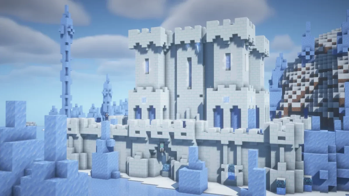 mod Minecraft Frostiful château du Frostologer bâti en neige compactée avec des stalactites le long des remparts