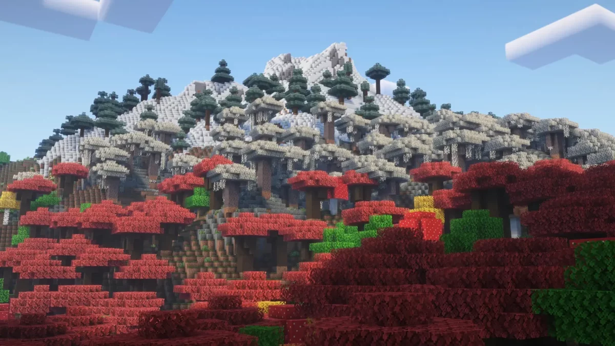 pack de texture Minecraft Enhanced arbres rouges blancs et jaunes etages au pied d'une montagne enneigee