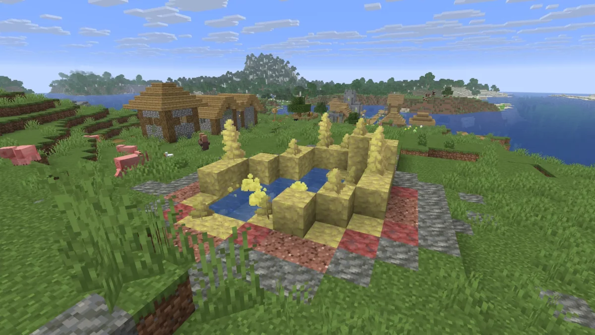 Grande source sulfureuse jaune générée en surface près d'un village dans Minecraft, avec soufre, soufre concentré et eau