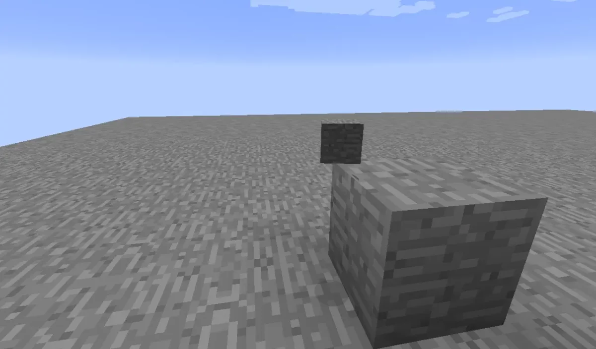 bug MC-4 de Minecraft un objet de pierre flotte au mauvais endroit en l'air à côté d'un bloc de pierre