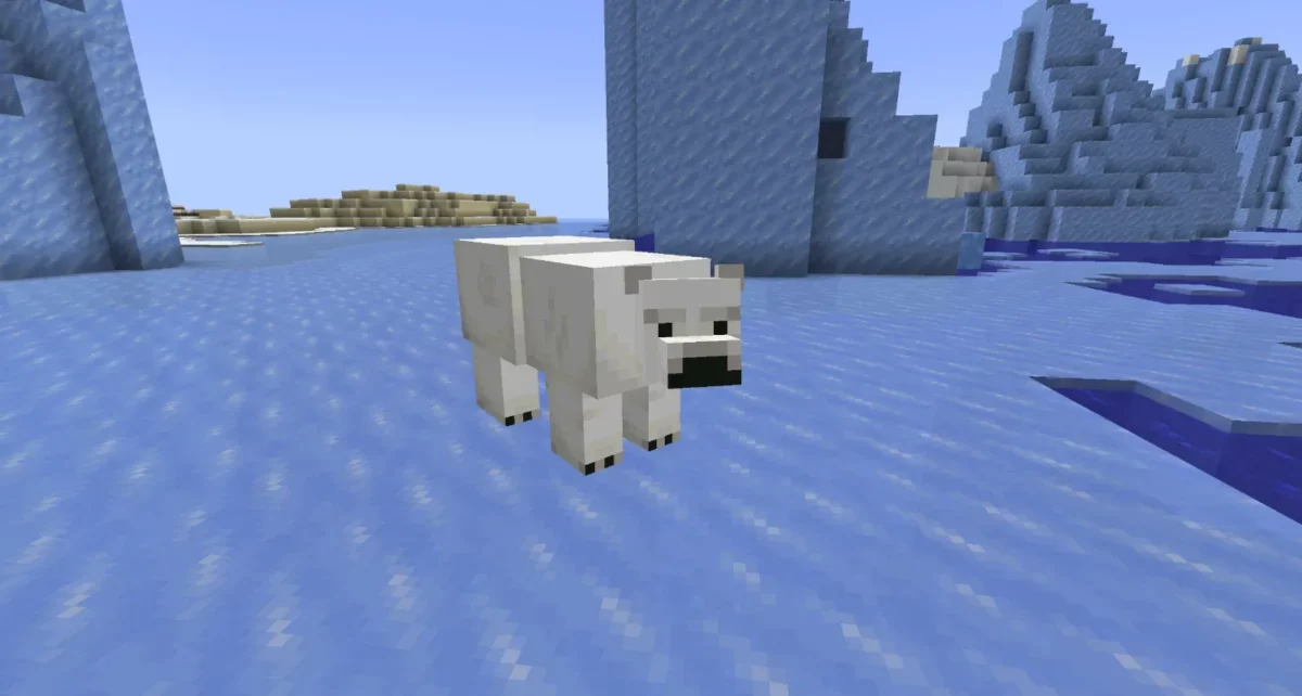 mod Minecraft Frostiful ours polaire au pelage en bataille assis dans la neige