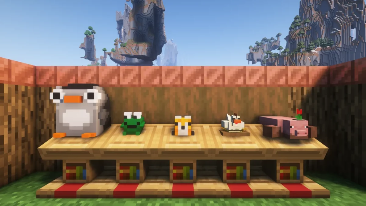 mod Minecraft Plushables affichant les cinq premières peluches du catalogue posées en décoration
