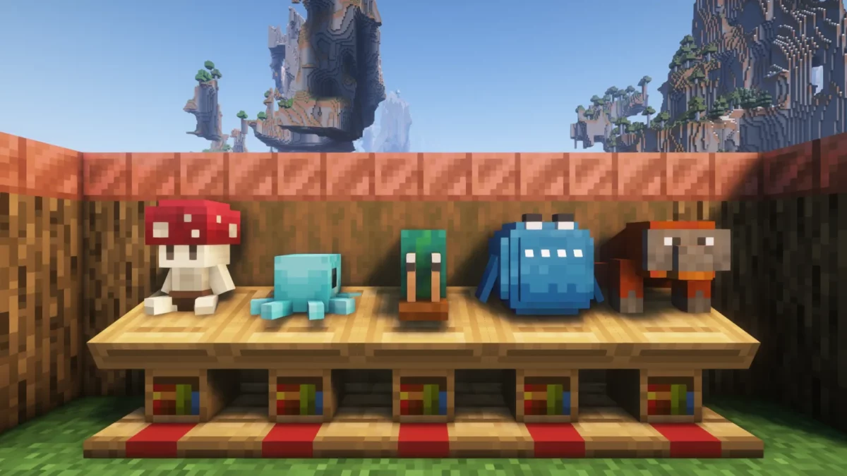 mod Minecraft Plushables présentant cinq peluches que l'on peut tenir, porter ou exposer