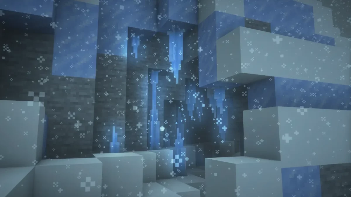 mod Minecraft Frostiful stalactites de glace suspendues au plafond d'une grotte sombre et gelée