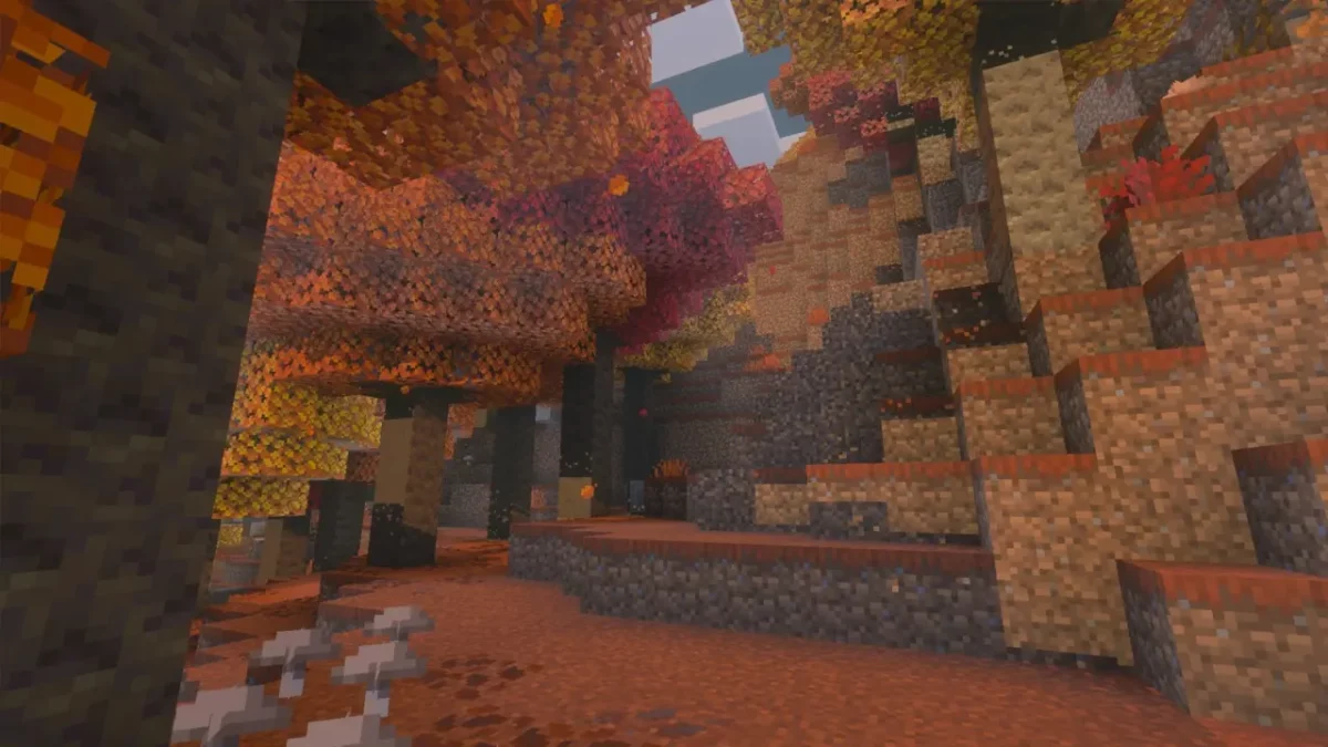 Biome Minecraft forêt tachetée avec une canopée de peupliers aux feuilles orange et rouges au-dessus d'un sol couleur rouille