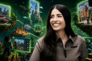 Xbox veut faire de Minecraft « la plateforme mondiale des créateurs » : vers un Roblox 2.0 ? Asha Sharma entourée de mondes Minecraft reliés entre eux pour illustrer la future plateforme mondiale des créateurs d’Xbox